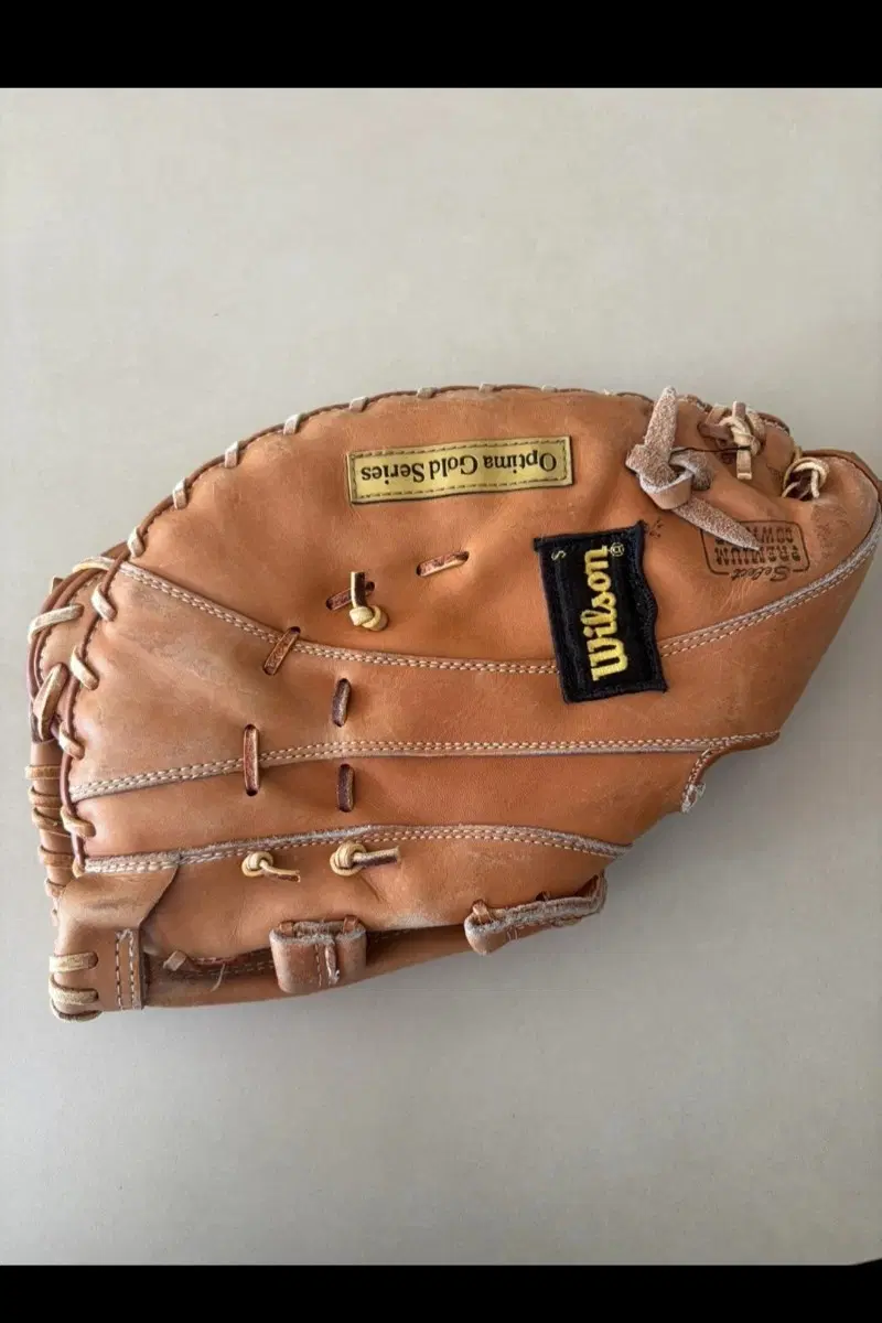 윌슨 Optima Gold Series 1루미트