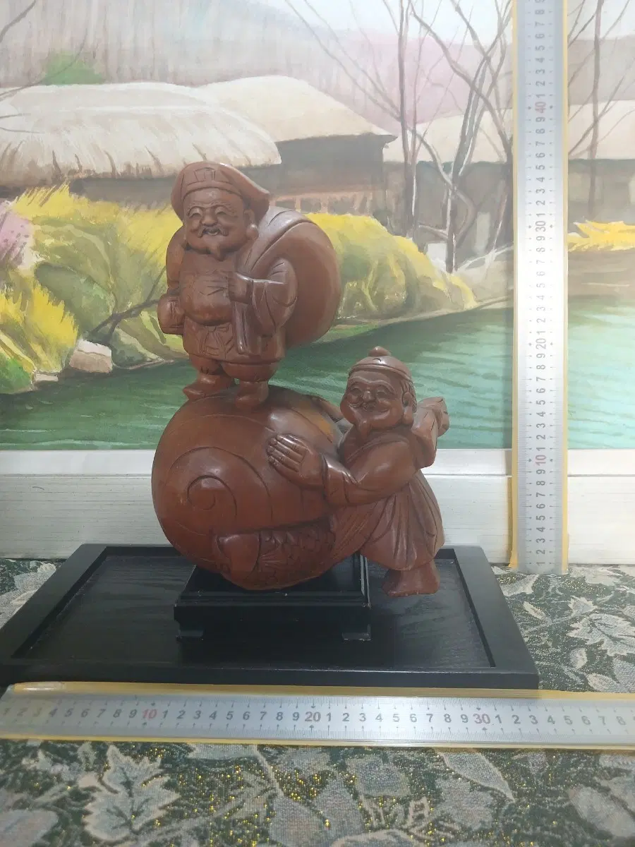나무 조각 복을 기원하는 두 남신상