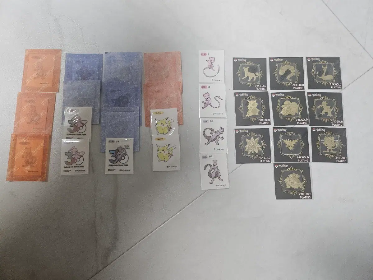 포켓몬 아트워크 뮤츠, 피카츄, 30로고 뮤츠, 뮤, 24k 금박 띠부씰들 판매