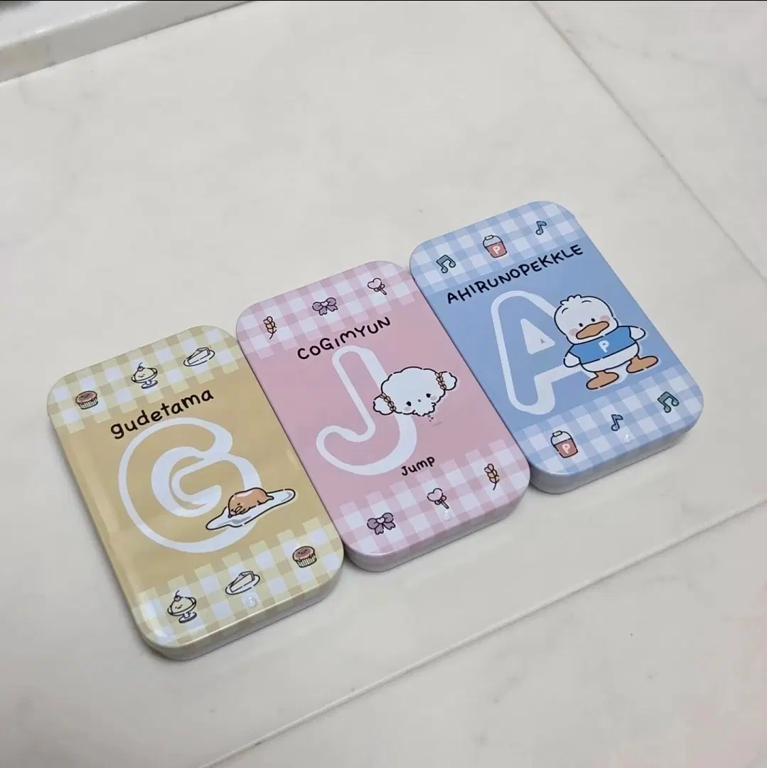 산리오 알파벳 틴케이스 슬라이드 캔 / 구데타마 / 코기뮹 / 아히루노페클