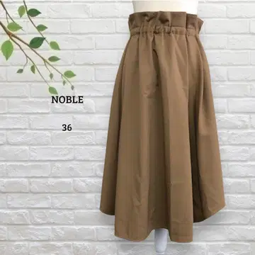 노블 NOBLE 플레어 헴 스커트 미디 기장 울 혼방 가을/겨울