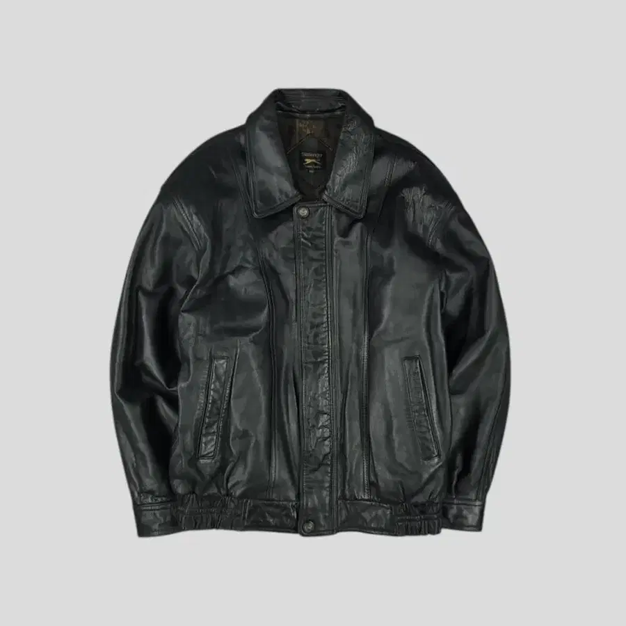 SLAZENGER 슬레진저 90s 블랙 각인 로고 절개 히든지퍼 패디드 램스킨 양가죽 카라넥 봄버 레더자켓 가죽자켓 L
