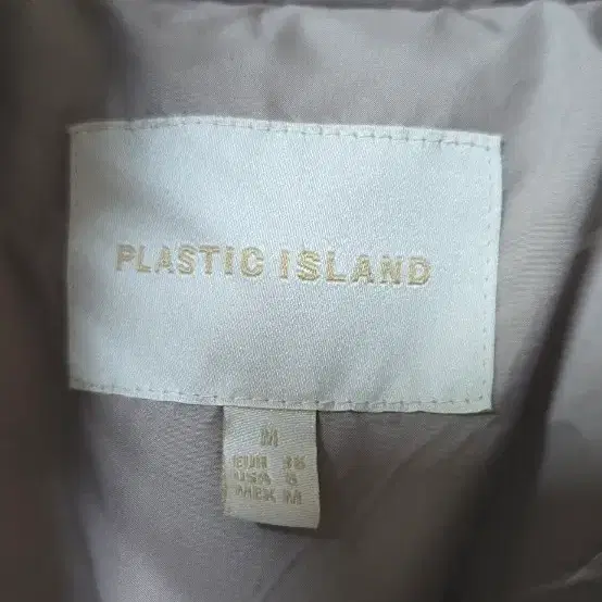 플라스틱 아일랜드 퍼 패딩 M