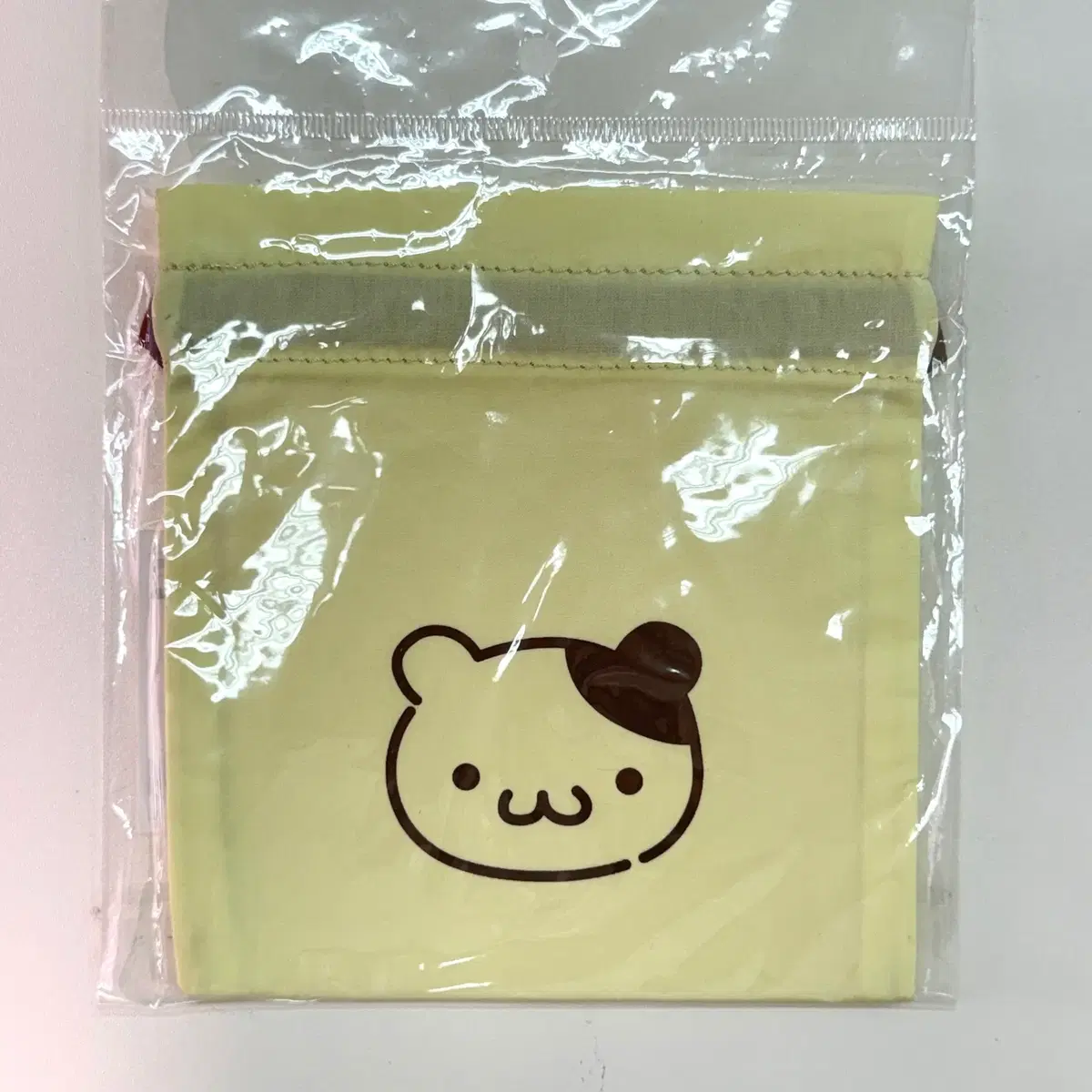 산리오 퓨로랜드 한정 머핀 조이개 미니 파우치