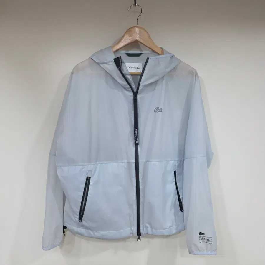 라코스테(Lacoste) 여성 투명 윈드브레이커 바람막이 자켓