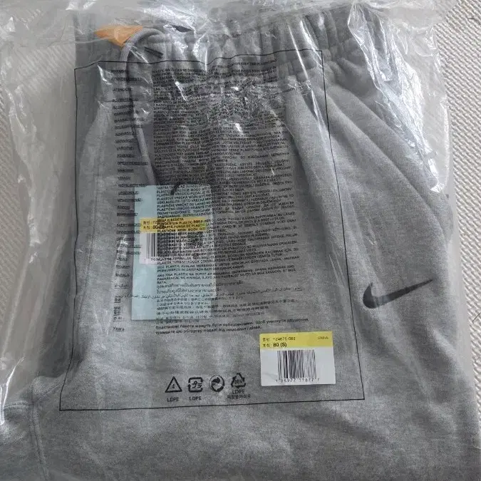 나이키 녹타 오픈헴 플리스 팬츠
