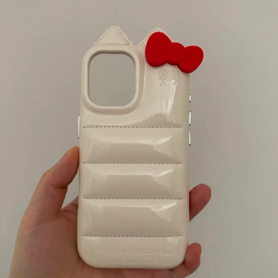 어반소피스티케이션 헬로키티 아이폰17 케이스 Urban Sophistication The Puffer Case - Hello Kitty