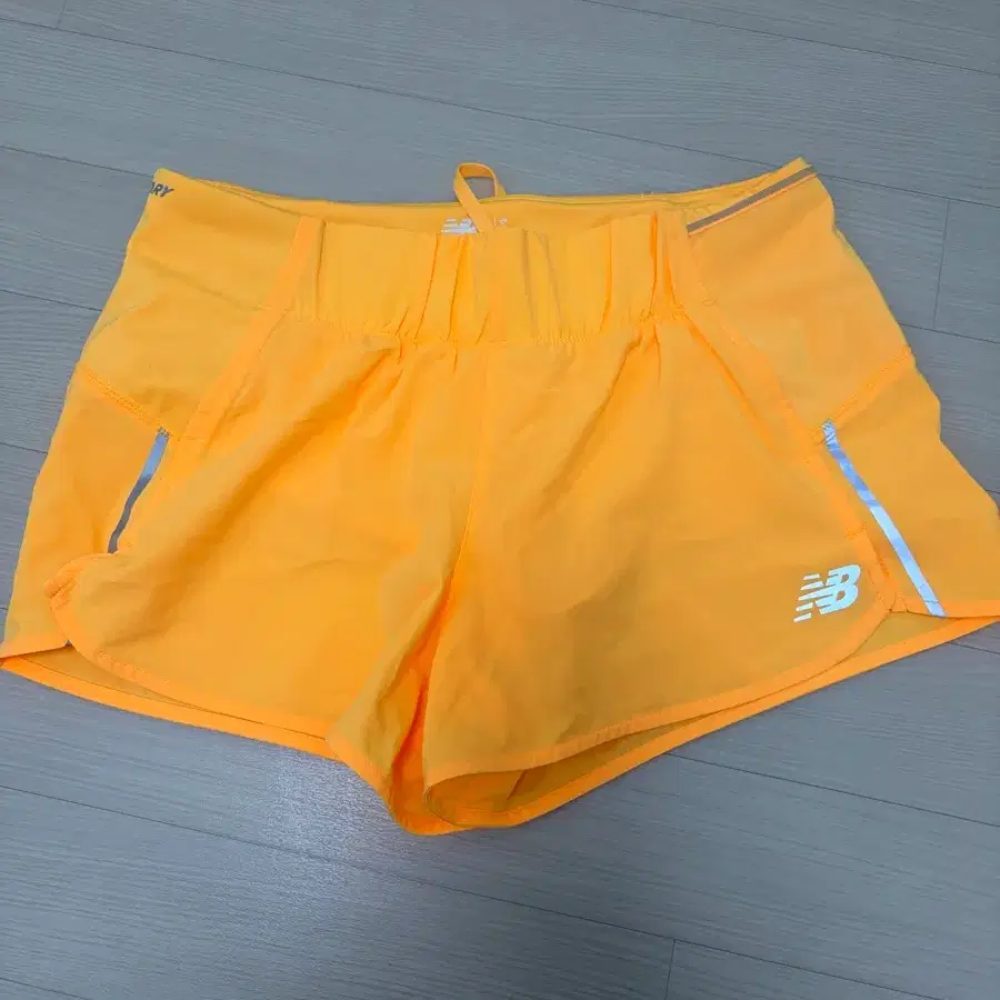 뉴발란스 오렌지 러닝 쇼츠 s