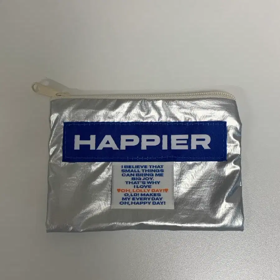 오롤리데이 해피어 라벨 파우치 실버 S