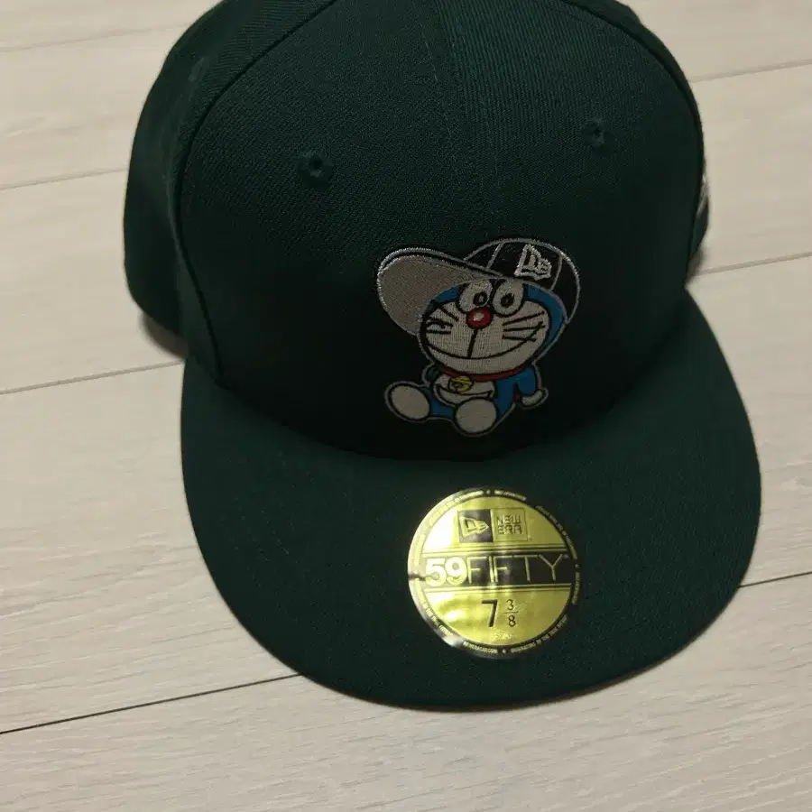 뉴에라 도라에몽 사이즈캡 7 3/8