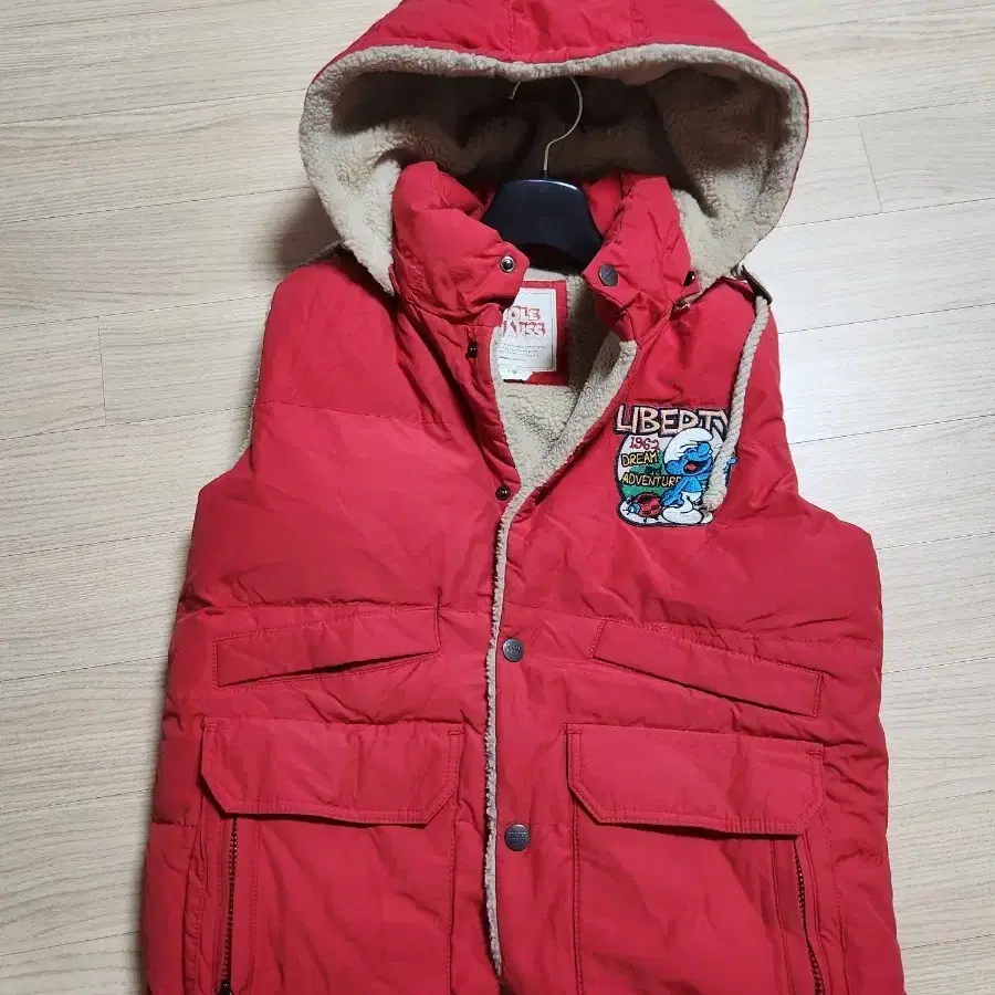 홀아우스 패딩조끼 95