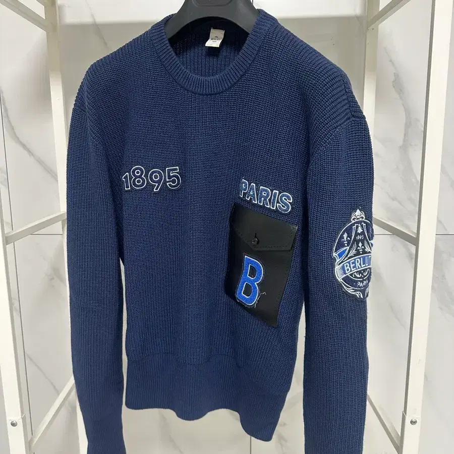 벨루티 니트
