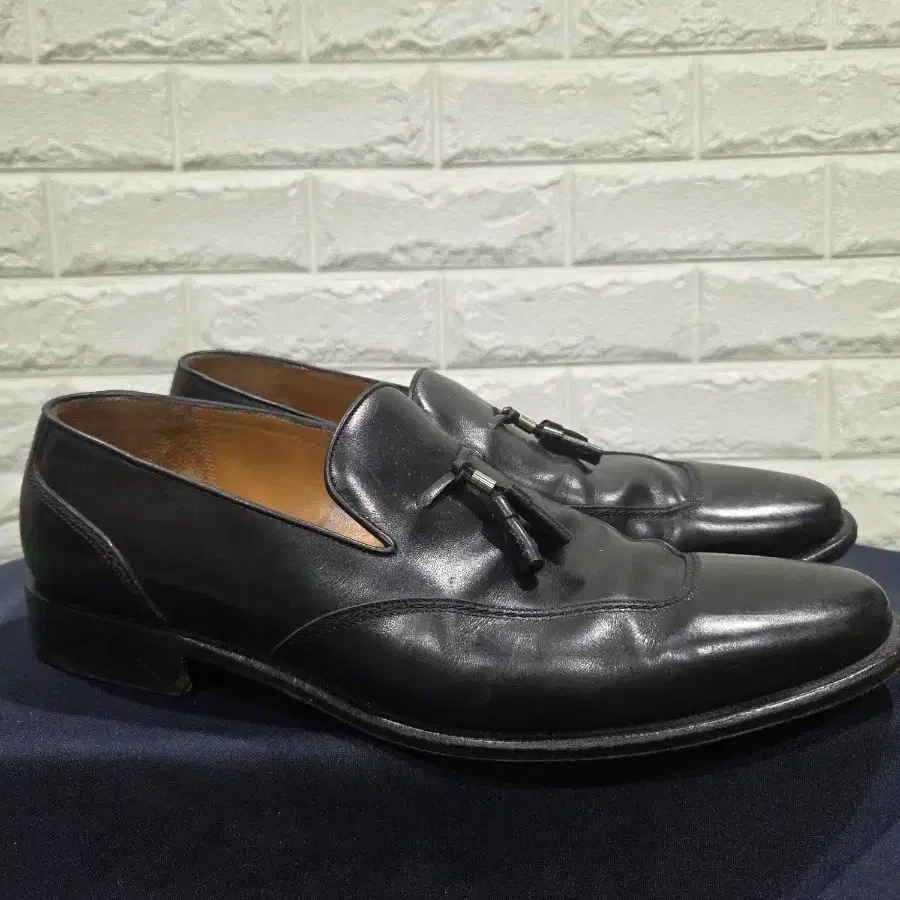 페라가모(Salvatore Ferragamo)의 남성용 가죽 태슬 로퍼