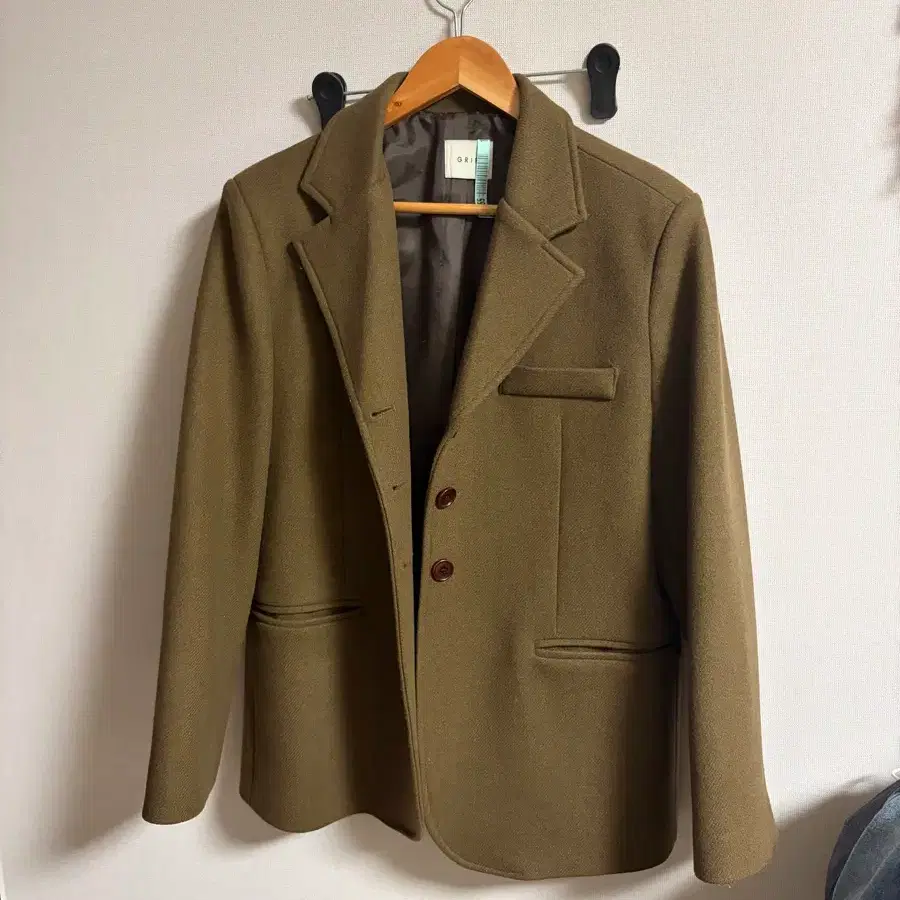 쉬이즈큐트 모직 자켓