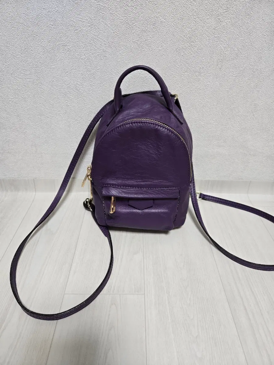 Purple leather backpack