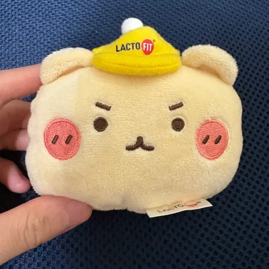 ラクトフィットマンゴー手首クッション保護人形顔
