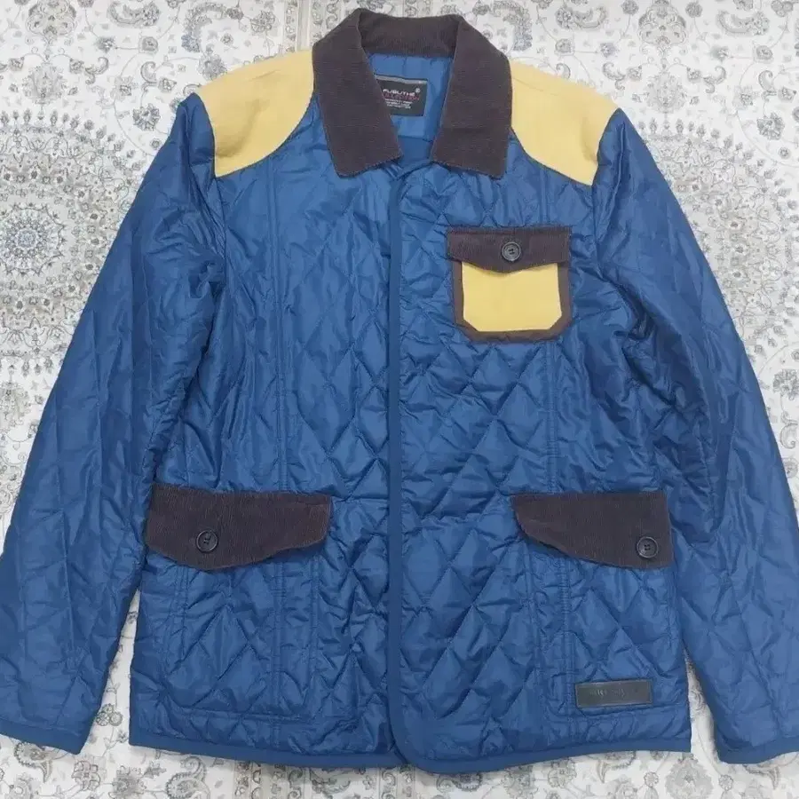 FUBU 믹스매치 코듀로이 깃 퀼팅 점퍼 100