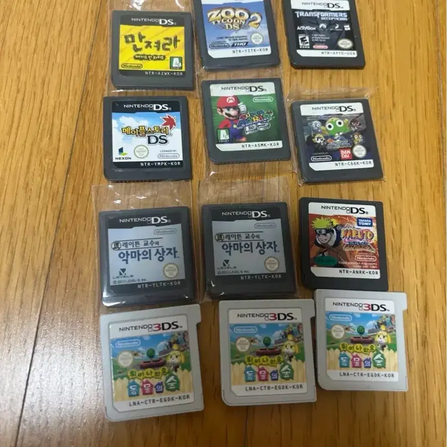 가겨내림 닌텐도ds,3ds칩 12개 일괄 동숲 마리오 나루토 케로로 만져라 zoo 레이튼 트렌스 메이플