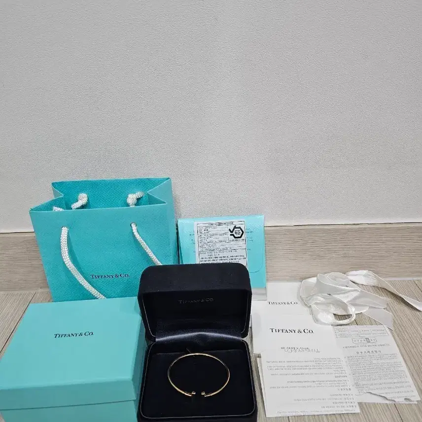 티파니앤코 정품 T 와이어 팔찌 로즈골드 스몰 사진 1