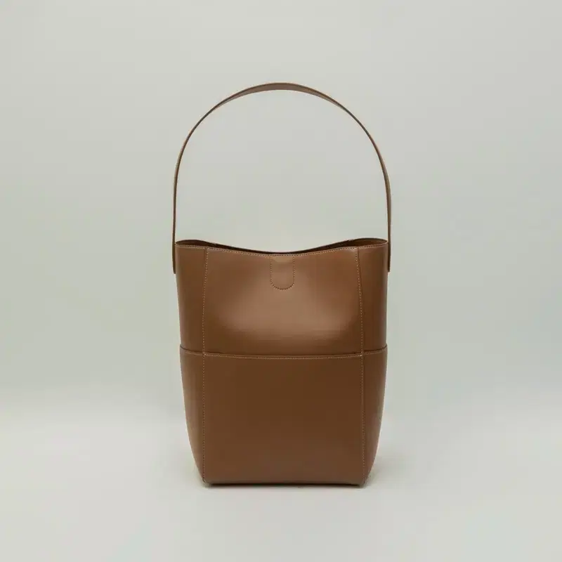 [SAGEMENT] STITCH LEATHER BUCKET BAG_CAMEL