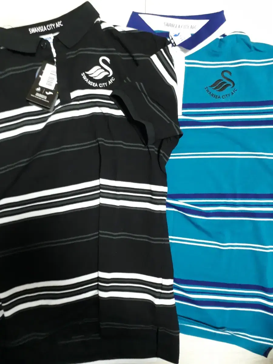 2 Joma Swansea kara shirts