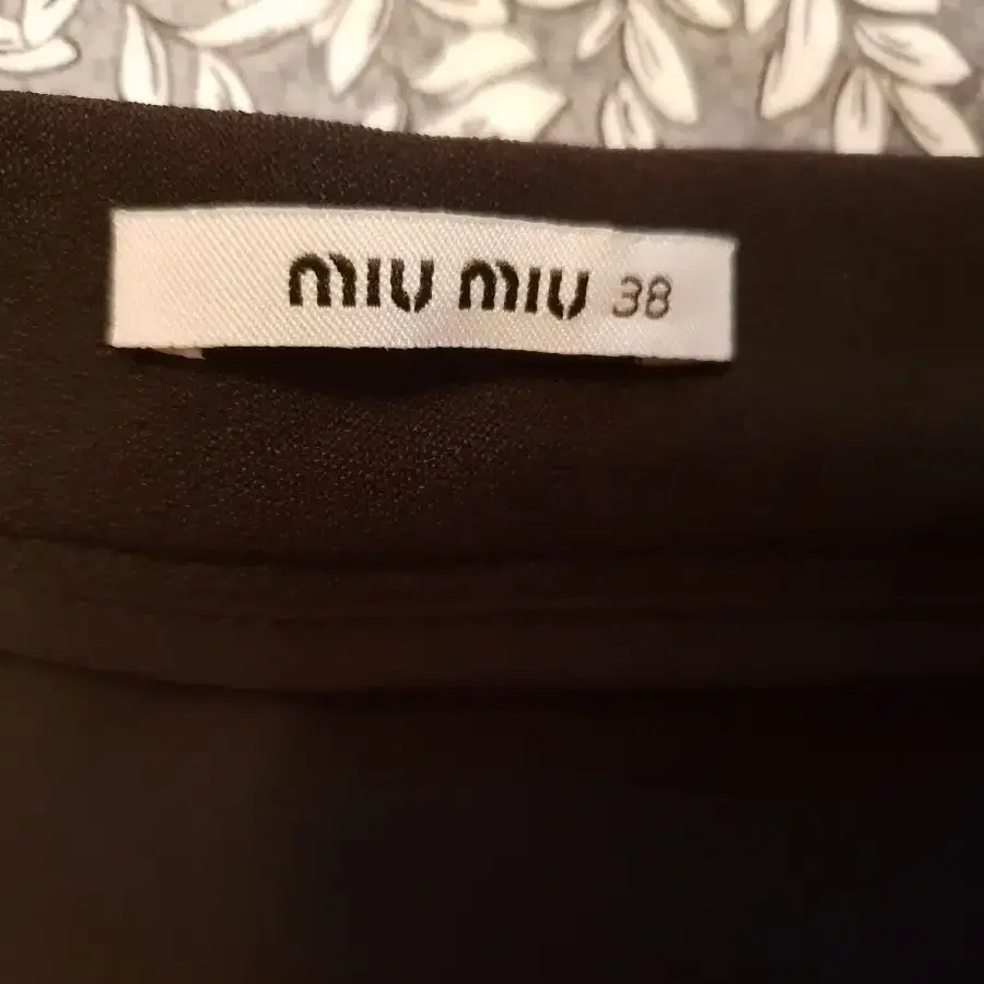 (정품) MIU MIU 스커트