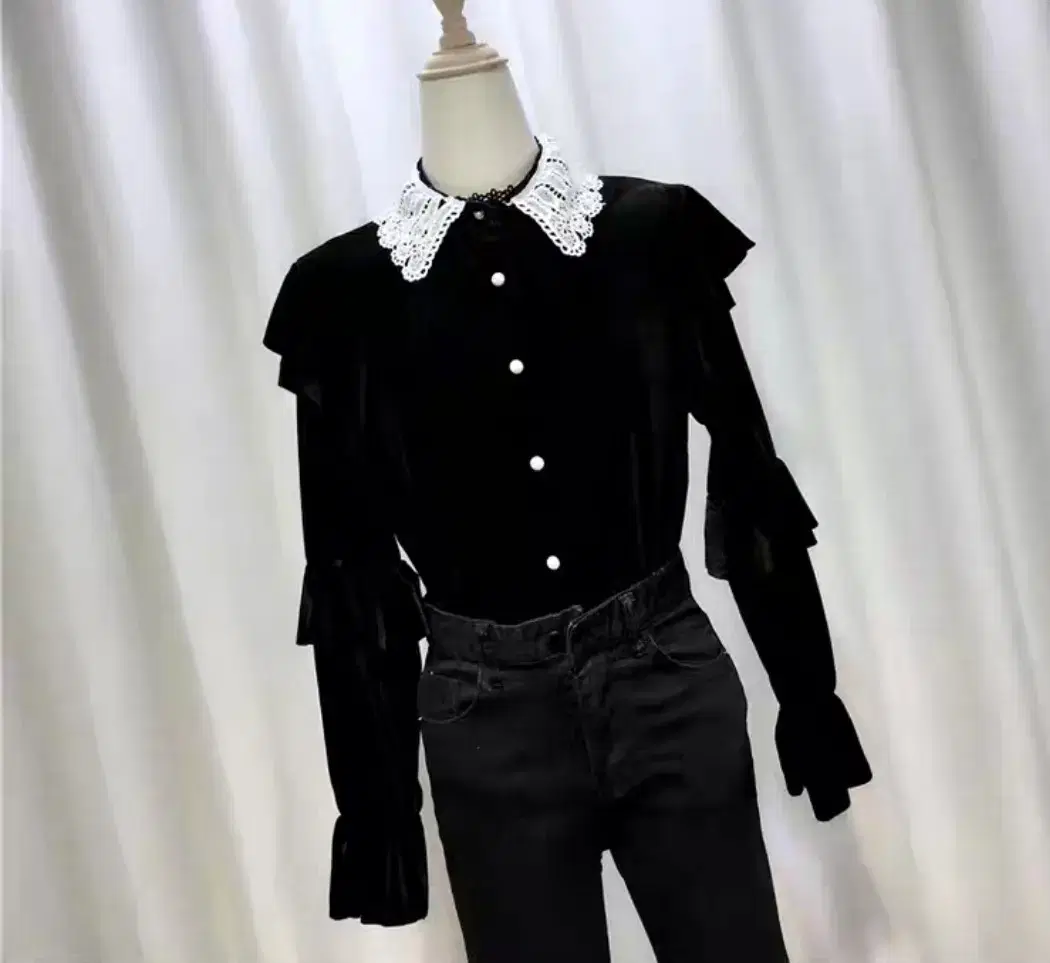 Black velvet ruffled blouse