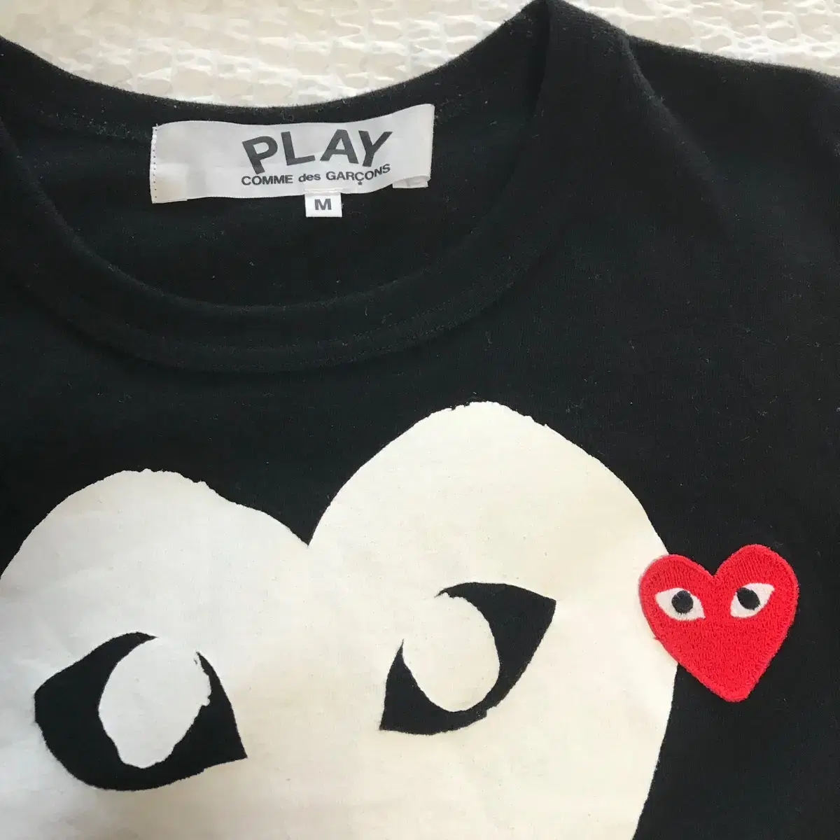 Communicate and sell Comme des Garçons T-shirts